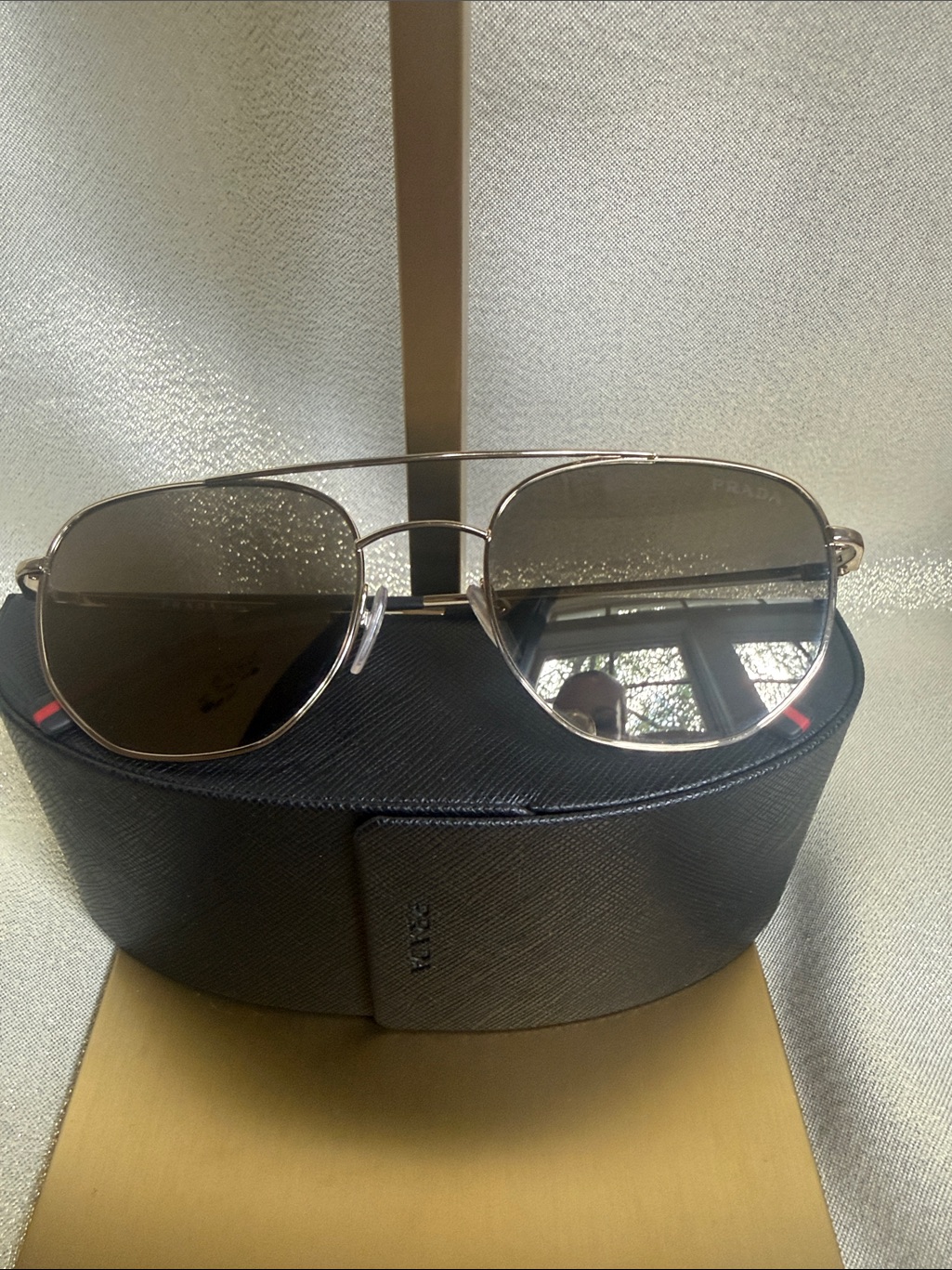 Prada Silver Frame Gray Lens Aviator Sunglasses